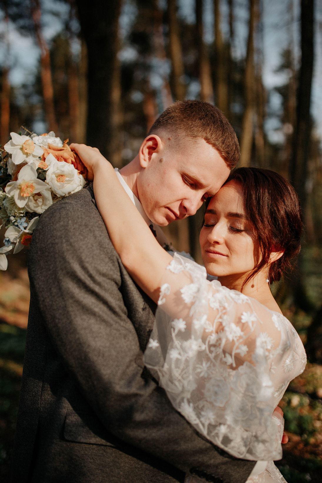 A Couple Hugging While Eyes Closed 